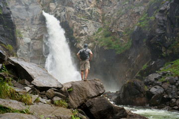 person in a waterfall