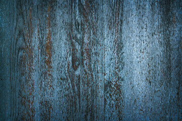 Vertical rustic wood planks with lots of texture in blue tones.