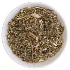 Overhead view of dried mugwort (Artemisia vulgaris) in a white bowl, isolated on white background