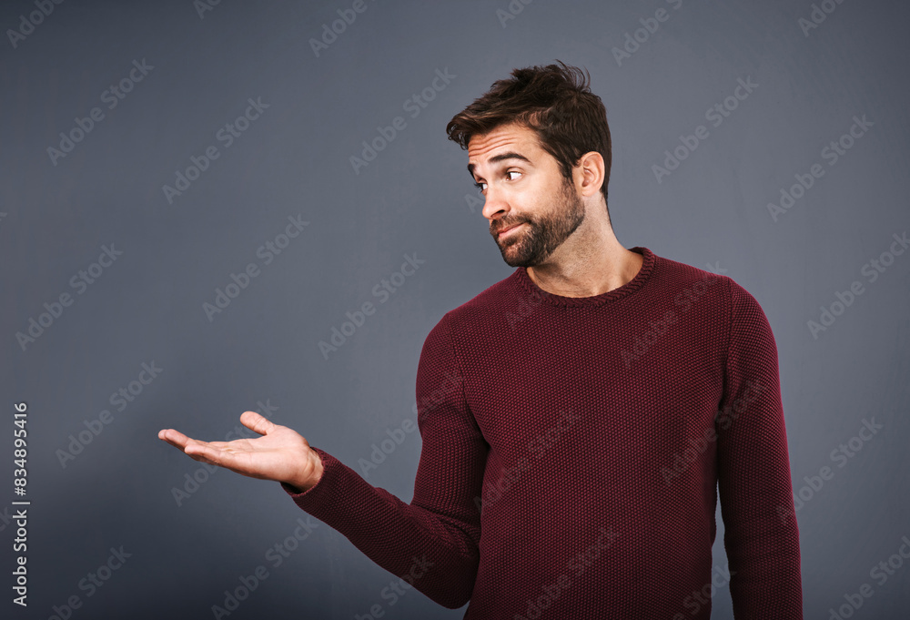 Poster man, palm and suggestion with mockup for advertising, decision or selection on a gray studio backgro