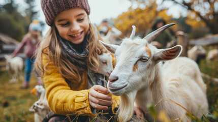 Family visit to a farm with children happily engaging with goats