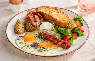 Hearty Traditional Breakfast Plate with Eggs, Sausage, Bacon, Toast, and Vegetable Salad