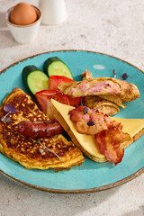 Hearty Combo Breakfast with Omelette, Cheese Toast, Bacon, Sausage, and Fresh Vegetables
