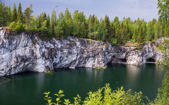 Karelian landscape with former marble quarry filled with groundwater