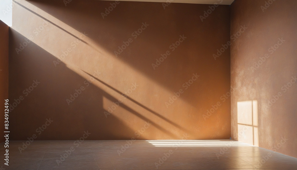 Poster abstract brown wall with sunlight casting shadows, creating a textured and diagonal composition