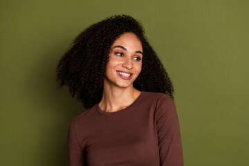 Fototapeta premium Photo portrait of lovely young lady look empty space dressed stylish brown garment isolated on khaki color background