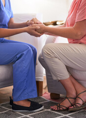 Obraz premium Woman, holding hands and caregiver of support in clinic for patient support, sympathy or empathy of consultation of medical results. Healthcare, trust and hope of counselling together at nursing home