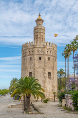 The ancient Torre del Oro tower, on the bank of the Guadalquivir river, Seville, Spain