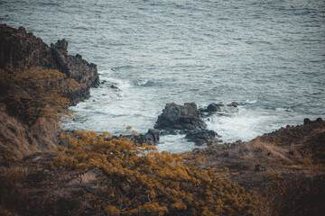 waves crashing on rocks