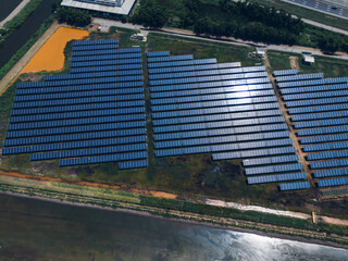 Obraz premium Ecology solar power station panels in the fields green energy . Aerial view of Solar panel, photovoltaic, alternative electricity source. Concept of sustainable resources.