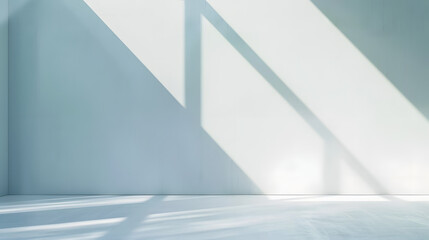 Fototapeta premium Light minimalist geometric background image in gray and light blue tones with light and shadow from window for product presentation.