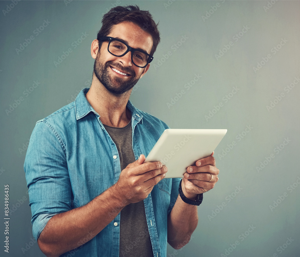 Aufkleber Man, gray background and portrait with tablet and glasses, career with software programming in London. Male creative, ebook or studio with happiness for digital job, mobile app or website development