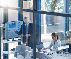 Business meeting, people and budget review with screen for revenue charts and statistics for profit...