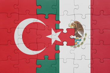 puzzle with the colourful national flag of mexico and flag of turkey.