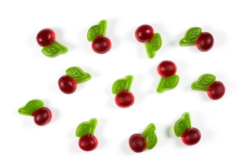 Fruit jelly candies in form of cherries on white background