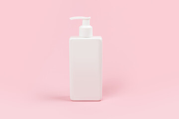 white dispenser bottle on pink background, cosmetic packaging mockup with copy space