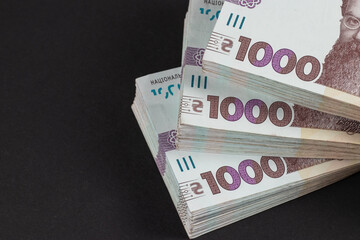 Stack of ukrainian money hryvnia. grivna, hryvna with 1000 banknotes