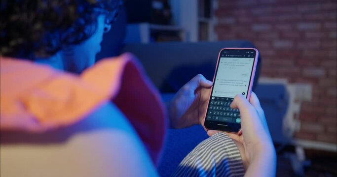 Young Woman Chatting With Artificial Intelligence on her smartphone