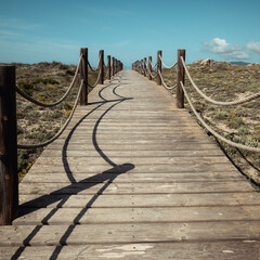 Wooden boardwalk at beach in Mallorca