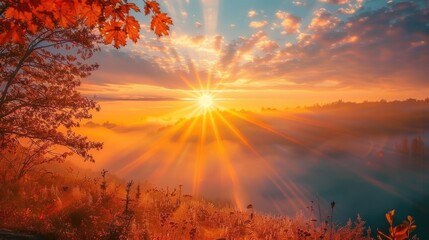 Obraz premium Sunrise with fog rays on a beautiful autumn morning