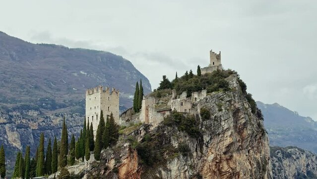Arco Castle ruined castle located on a prominent spur high above Arco and the Sarca Valley in Trentino. Aerial view