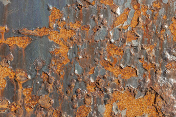 Rusted metal surface with textured decay