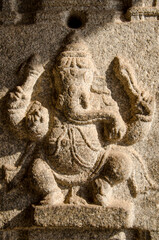 Stone mural sculpture of Lord Ganesha at Virupaksha temple, Hampi, Karnataka, India, Asia.