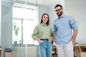 Photo of two people business partners feel confidence successful in modern workspace