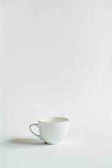 Minimalist white coffee cup on a clean background