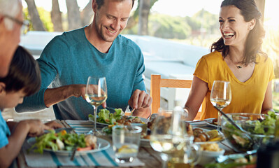 Happy family, eating and lunch with laughing outdoor on patio with funny conversation, bonding and...