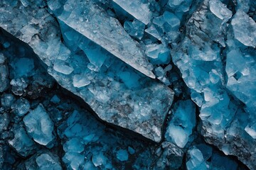 A striking wide-format background image showcasing blue tones reminiscent of an icy or stony texture, ideal for design or creative ventures.