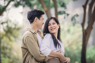 Lesbian couple sharing romantic love and care in public, celebrating joyful union as life partners.