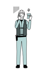Senior male engineer in helmet and work wear looking at his bankbook and feeling depressed.