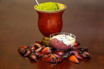 Typical Gaucho culture, yerba mate mate, red wine sago, pine nuts and rustic colonial salami