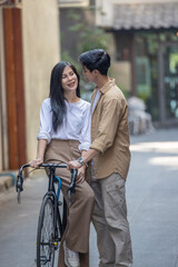 Lesbian couple sharing romantic love and care in public, celebrating joyful union as life partners.