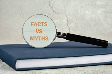 Business, financial and fact vs myth concept. Copy space. Concept words, symbol Fact vs myth...
