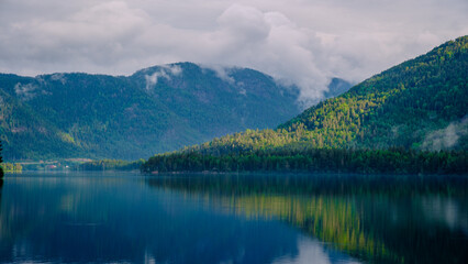 Araksfjorden Lake in Norway is, a beautiful mountain lake at sunrise in Southern Norway
