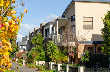 A row of suburban residential townhouses with modern and contemporary style in Australia. Concept...