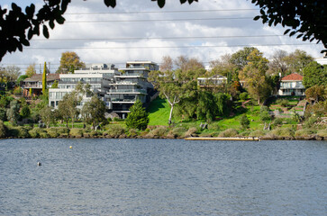 Luxury and upscale waterfront residential homes along the Maribyrnong River, in a suburb of...