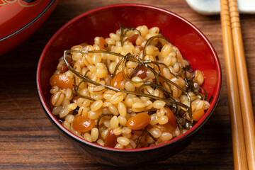 Bowl with Japanese Natto Miso close up on wooden table