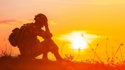 Silhouette of a soldier sitting in contemplation during sunset, reflecting on the horizon. A moment of peace and introspection.