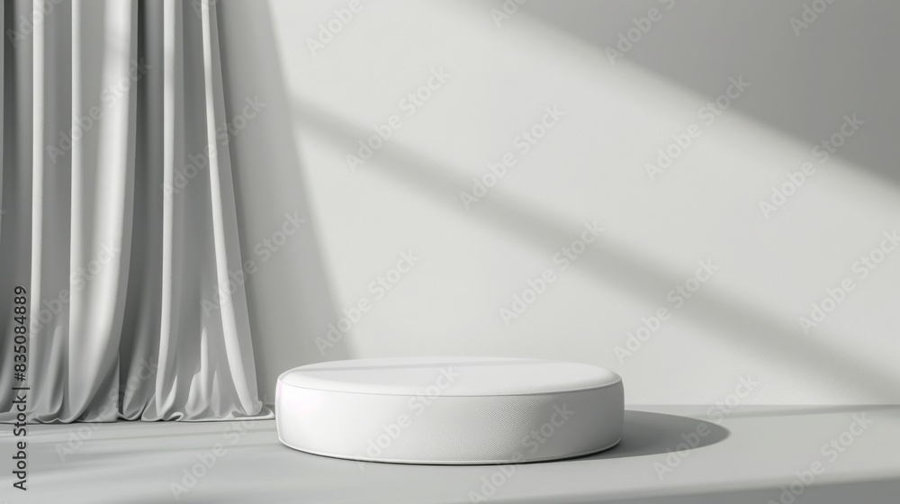 Poster a white object is placed on top of a white floor in a minimalist setting.