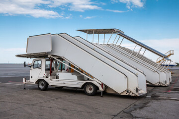 Passenger boarding stairs at the parking lot at the airport