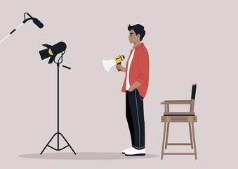 A movie director stands on a set, holding a megaphone, giving instructions, A spotlight and microphone are visible in the background