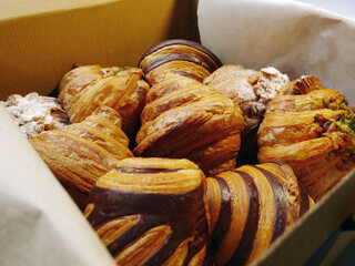 Fresh croissants with brown recycled wrapper