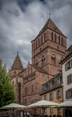 Fototapeta premium Strasbourg, France - 06 28 2023: Strasbourg city: View of the facade of St. Thomas Church.