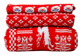 Folded red christmas clothes on white background isolation