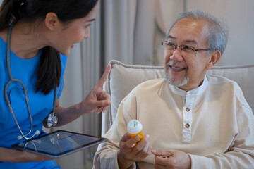 Female health care worker is take care senior man at home.