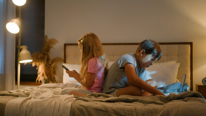 Gadget addiction. Caucasian family little children girl daughter using mobile phone boy son...