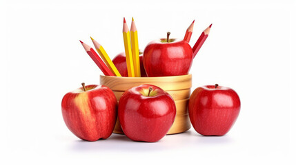 A group of red apples and pencils in a wooden bowl isolated on a white background